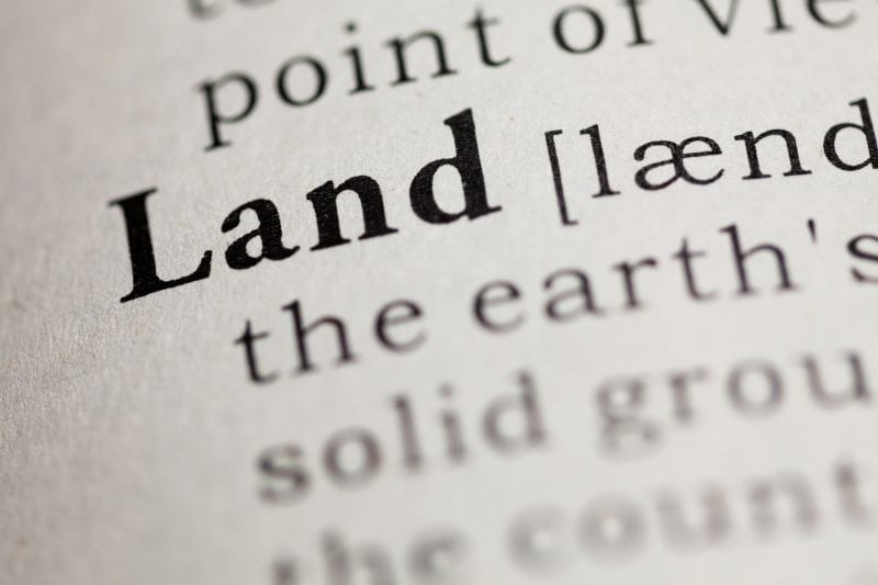 Partial definition of the word land on a dictionary page