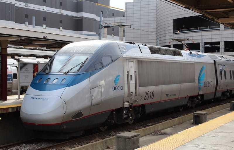 Acela train approaches a station