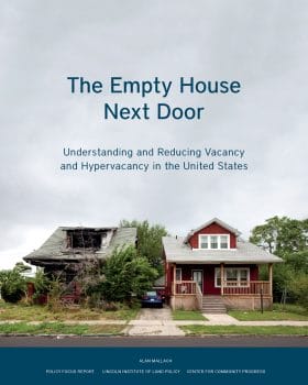 Cover of the report titled "The Empty House Next Door" by Alan Mallach. Cover shows two houses side-by-side