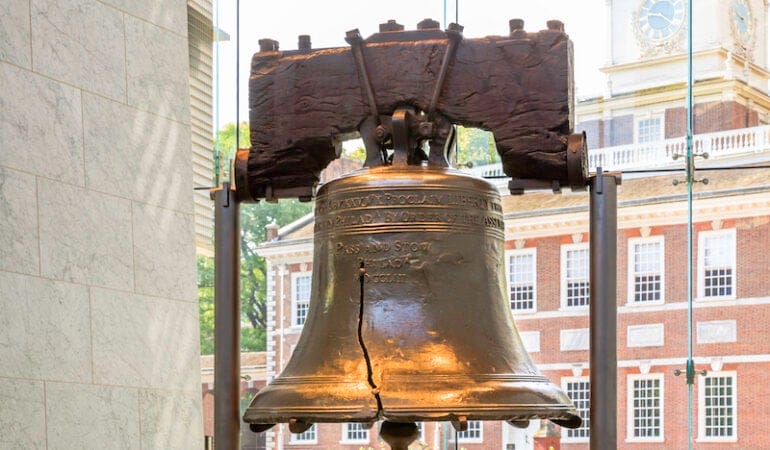 A metal bell fills most of the frame