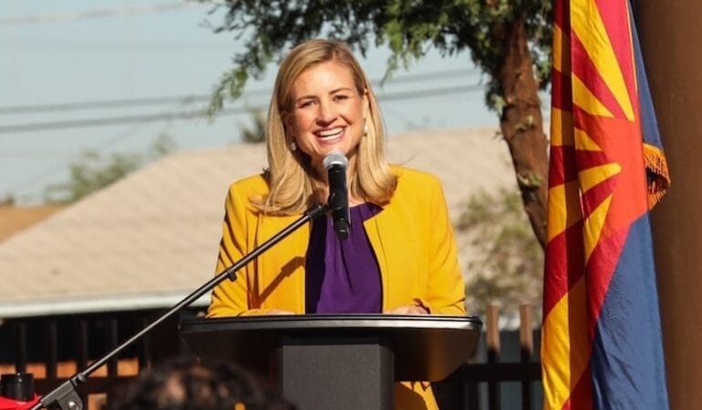 Mayor Kate Gallego speaks from a podium.