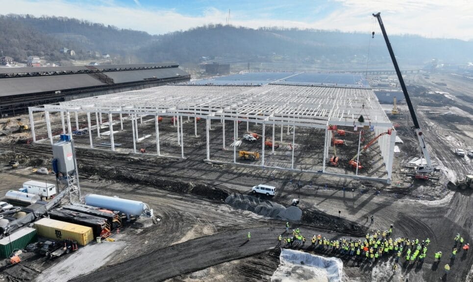 Photo of factory under construction.