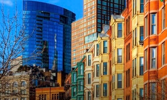 Photo of the exterior of a row of buildings on a street in the Back Bay neighborhood of Boston.
