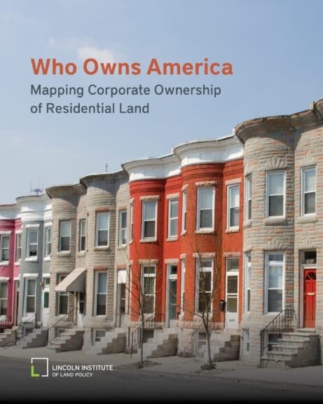 Cover of Who Owns America report featuring street view of houses in Baltimore.