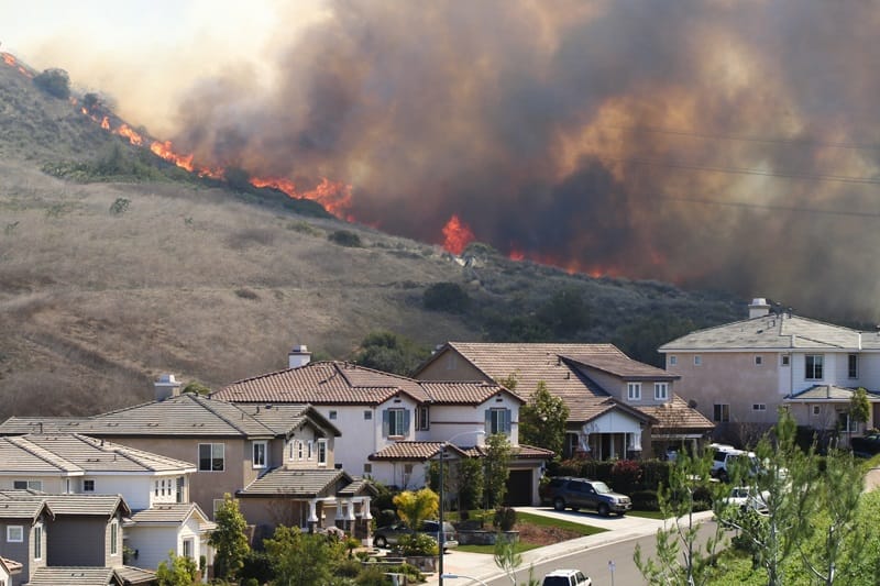 Fire on a southern California hillside above homes