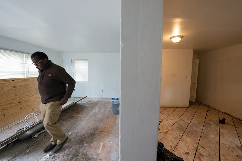 Port of Cincinnati contractor inspects the condition of a rental property
