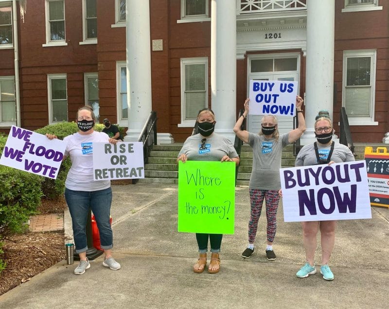 Terri Straka, left, with other members of Rosewood Strong, an advocacy group  she cofounded in her South Carolina community. After years of flooding, a  county-led buyout program began this year. Credit: Courtesy of Terri Straka.
